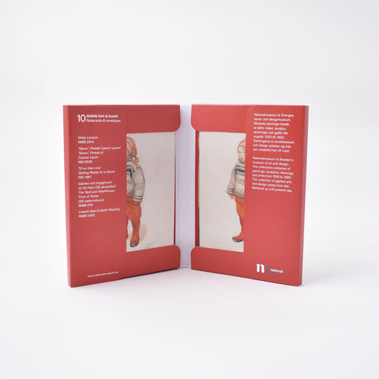 Röd mapp med kort och kuvert med vintermotiv av CArl LArsson