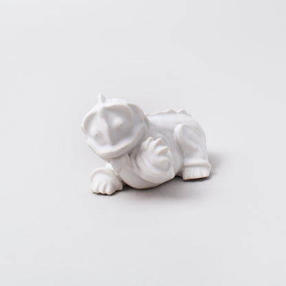 vit keramikfigurin Inez från kollektionen drakvalpar av Wilhelm Kåge i Nationamuseum shop