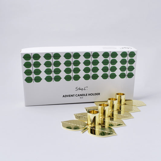 adventsljusstake med Berså av Stig Lidberg i guldfärg