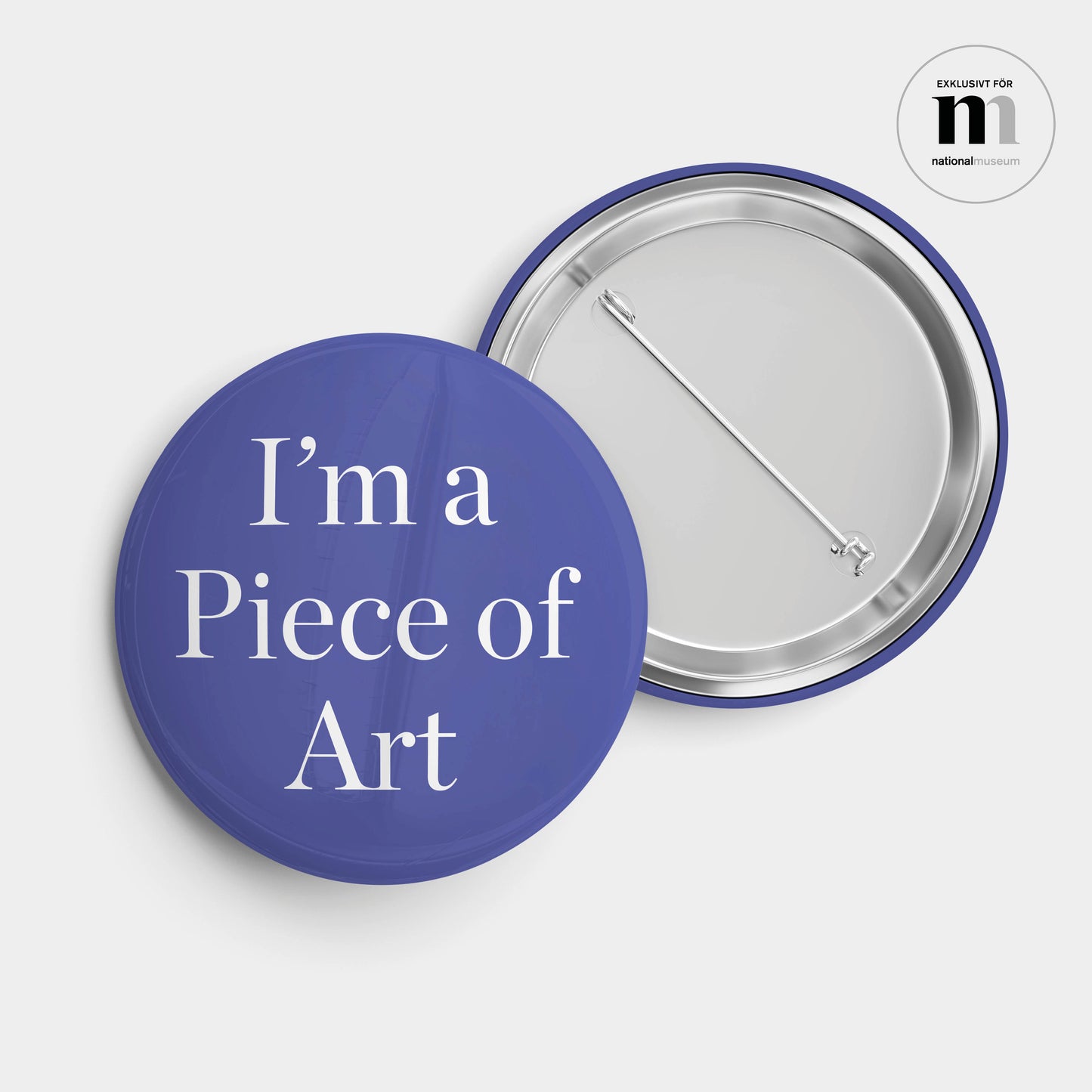 rund pin med nål i blått och texten I'm a piece of Art från Nationalmuseum