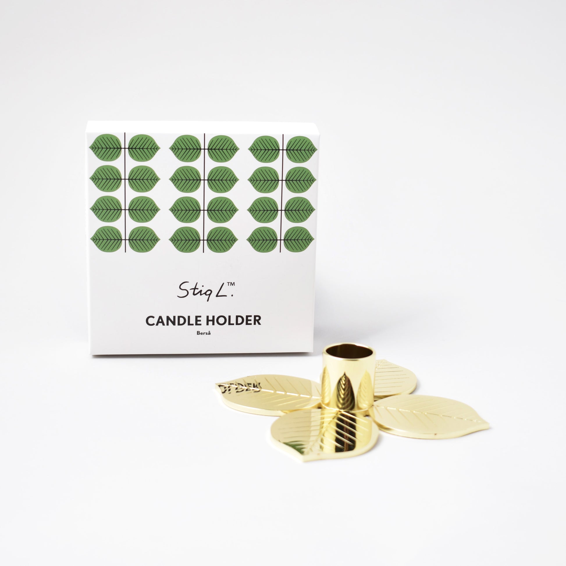 Guldfärgad ljusstake för stearinljus med Stig Lindbergs mönster Berså