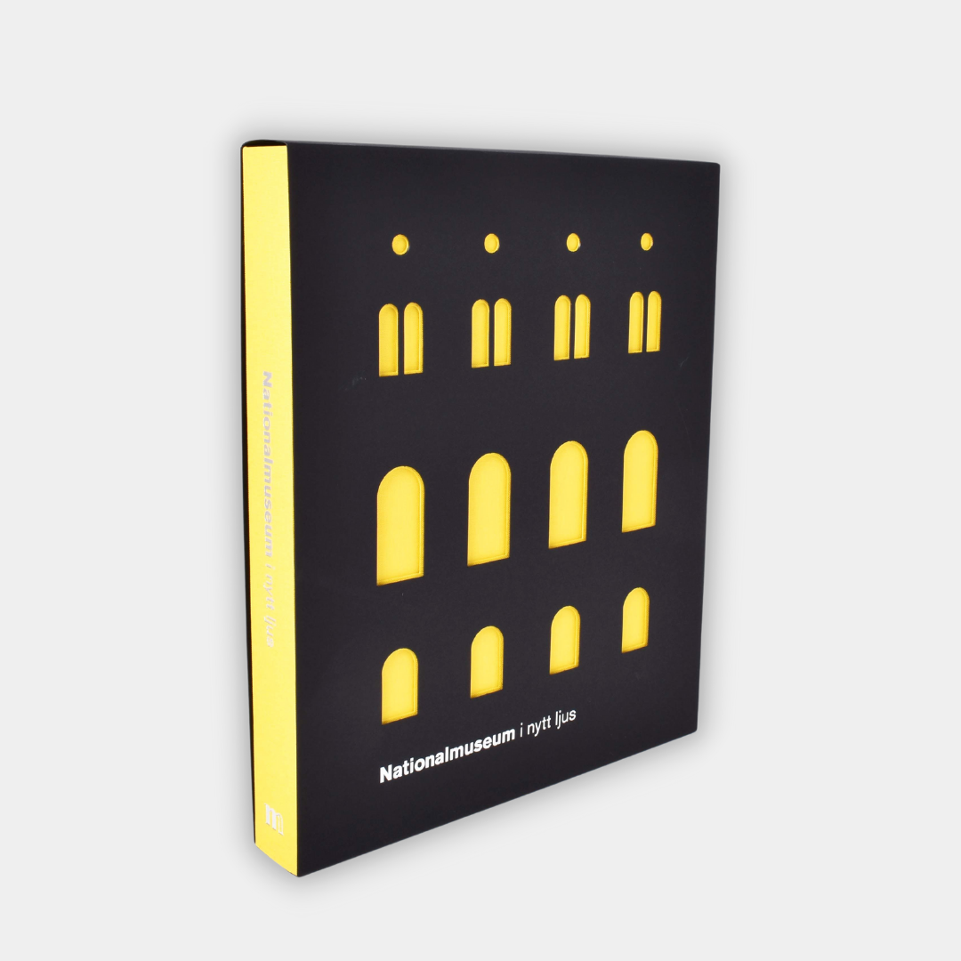 Boken nationalmuseum i nytt ljus i fodral med motiv av nationalmuseums fönster