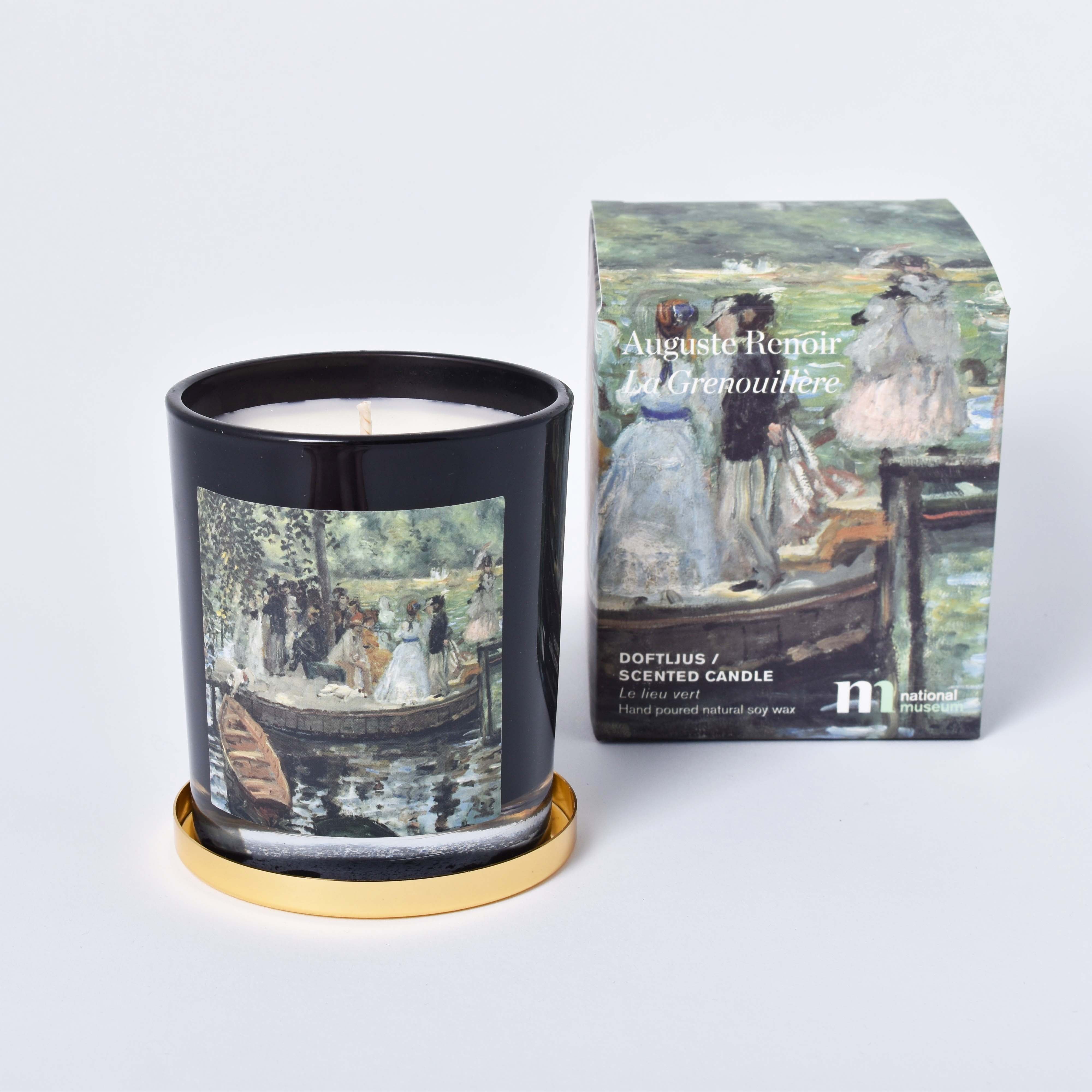 Doftljus med motiv av Auguste Renoirs La Grenouillère och lock av mässing och förpackning med samma motiv