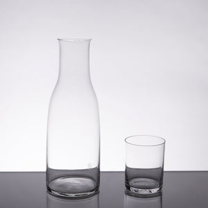 Vattenkaraff i klart glas designad av Ingegerd Råman inklusive dricksglas