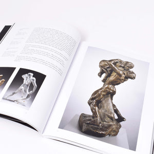 sida i boken "rodin" med bronsskulptur av Auguste Rodin